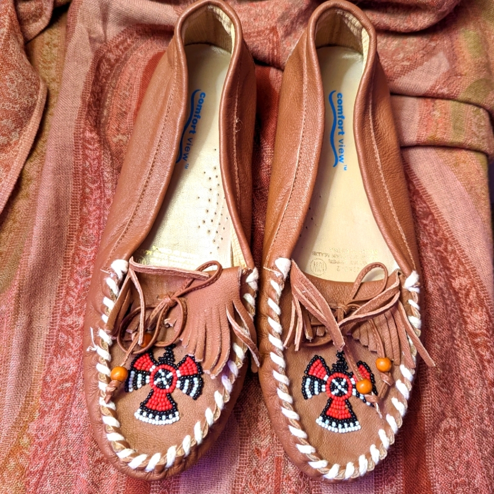 Brown leather moccasins in size 10W